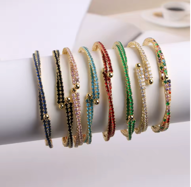 03509748 Pulsera expansible doble y trenzada en oro Laminado 18k (3capas)