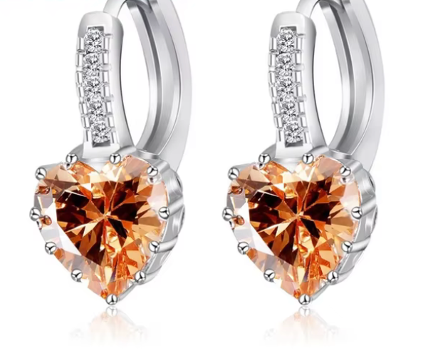 Aretes con piedra en forma de corazón en oro laminado blanco