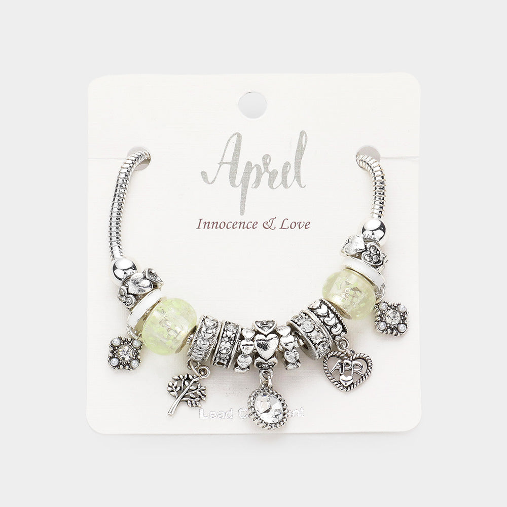 Meses - Pulsera con múltiples charms y dije de corazón con piedra natal