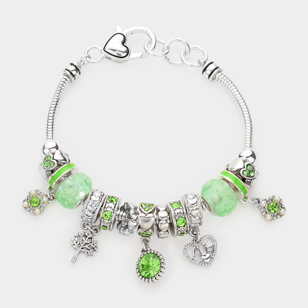 Meses - Pulsera con múltiples charms y dije de corazón con piedra natal