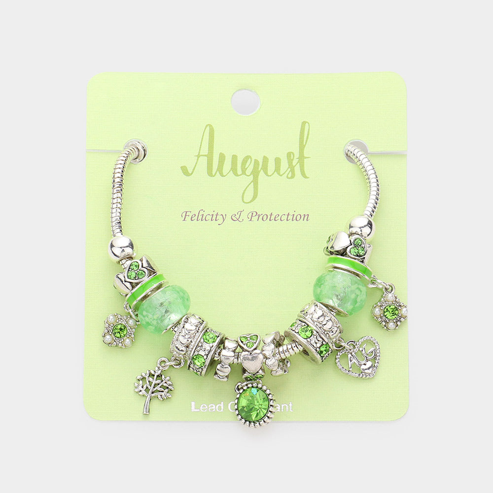 Meses - Pulsera con múltiples charms y dije de corazón con piedra natal
