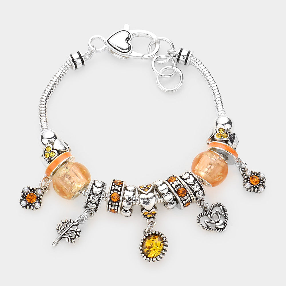Meses - Pulsera con múltiples charms y dije de corazón con piedra natal