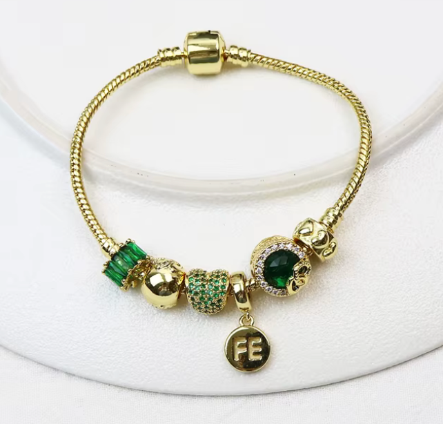 Pulsera tipo pandora en oro Laminado 18k (3capas)