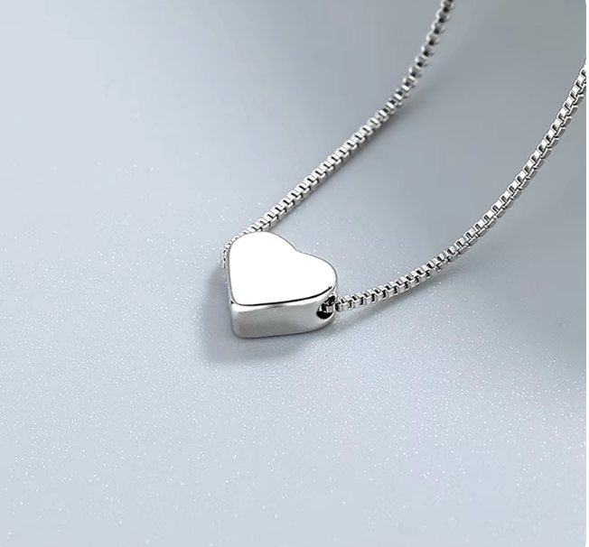 Cadena con dije de corazón / estrella en plata S925