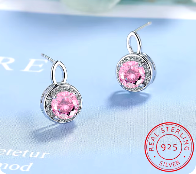 Aretes con piedra redonda de y ribete de brillantes de imitación en plata S925