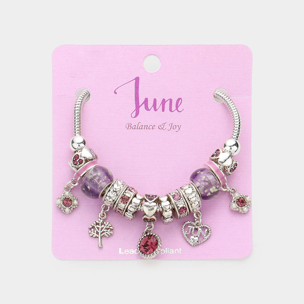 Meses - Pulsera con múltiples charms y dije de corazón con piedra natal