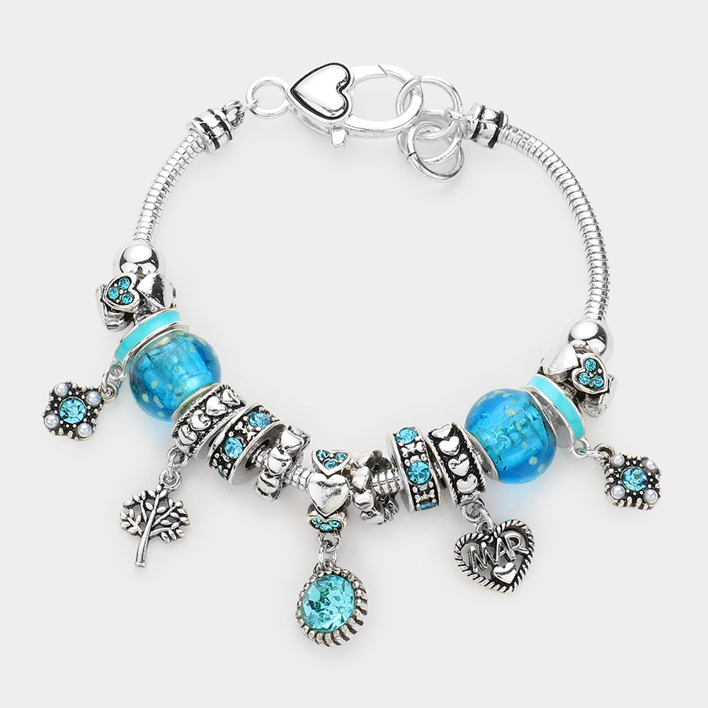 Meses - Pulsera con múltiples charms y dije de corazón con piedra natal