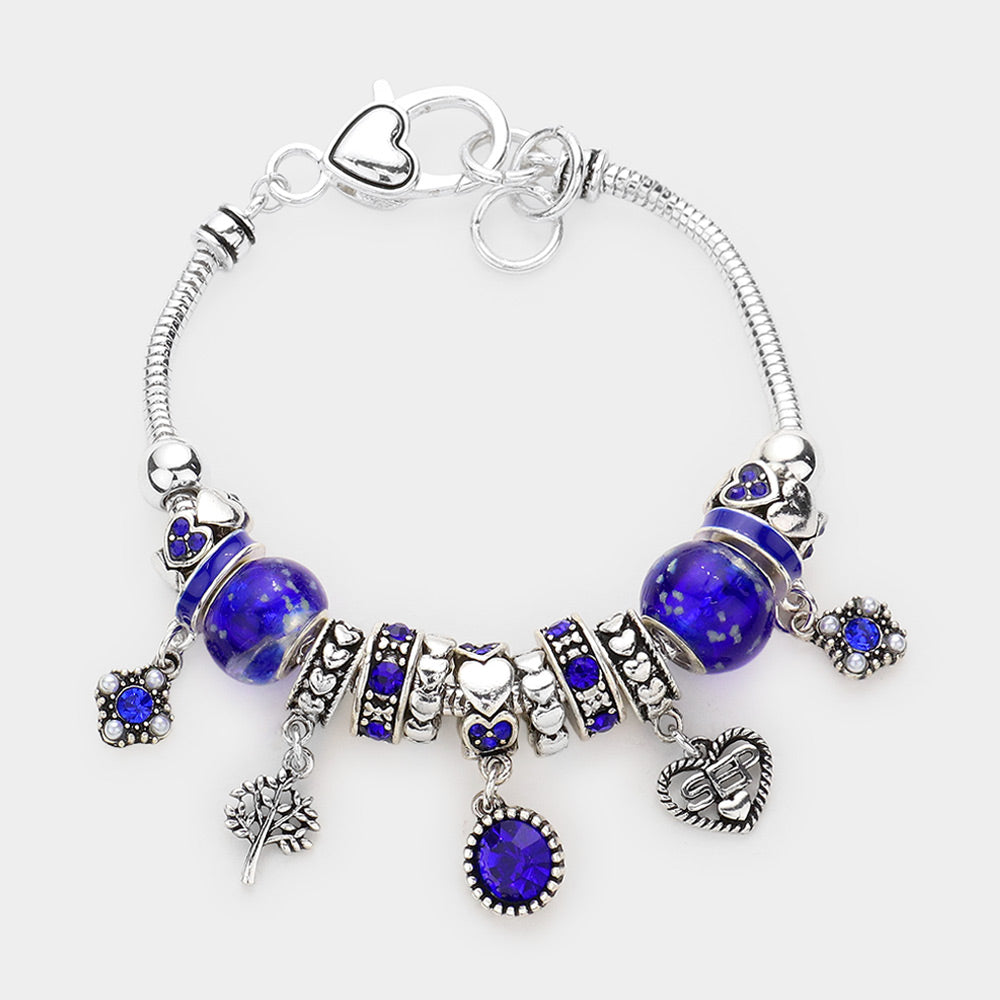 Meses - Pulsera con múltiples charms y dije de corazón con piedra natal