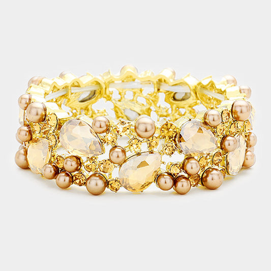 Pulsera elástica adornada con perlas y piedras en forma de lágrima