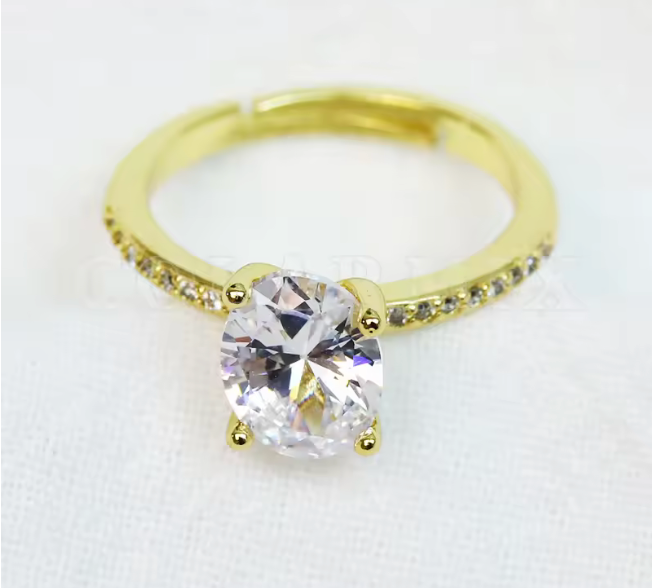 45781748 Anillo ajustable con piedra de cristal ovalada en oro laminado 18k (3 capas)