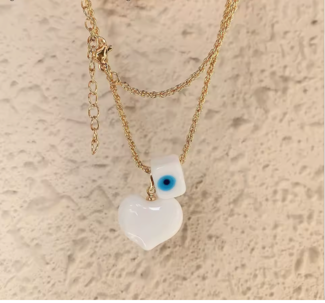 50956788 Cadena y dije corazon y ojo turco en oro laminado 18k (3 Capas)