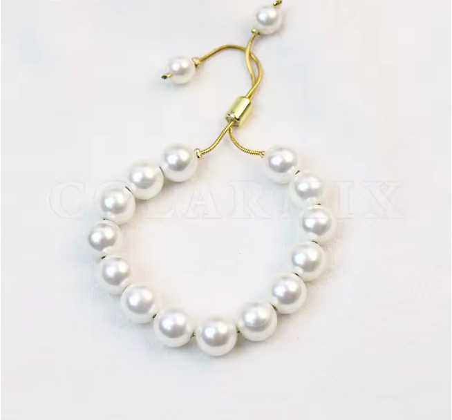 65944820 Pulsera ajustable de perlas en oro laminado 18k (3 Capas)