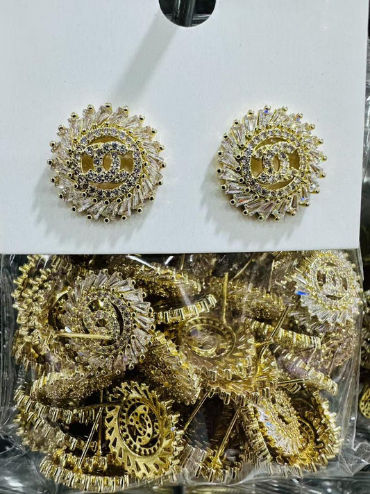 02741236 Aretes estilo Gucci con piedras baguettes en oro laminado 18k (3 Capas)